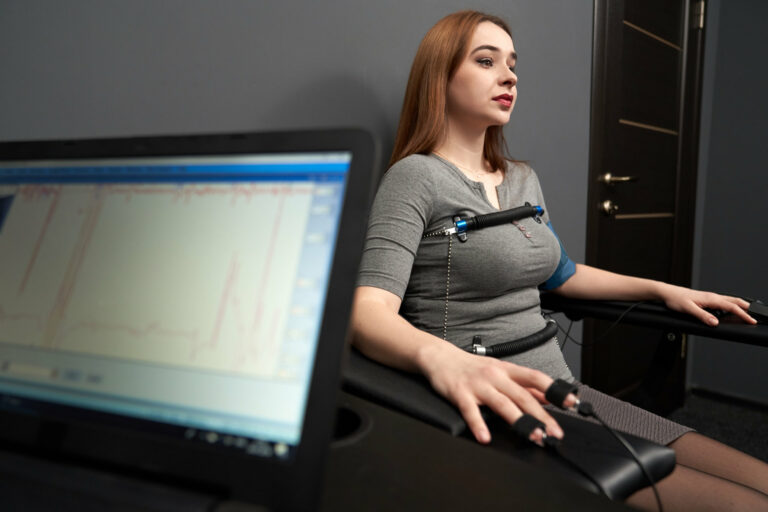 A woman undergoing a pre-employment polygraph examination